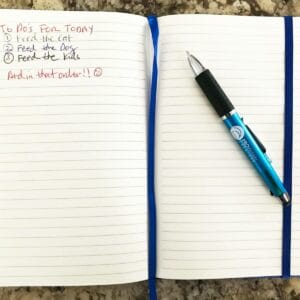 pwc notebook and pen in use with a todo list 1200h pwc notebook and pen in use with a todo list 1200h